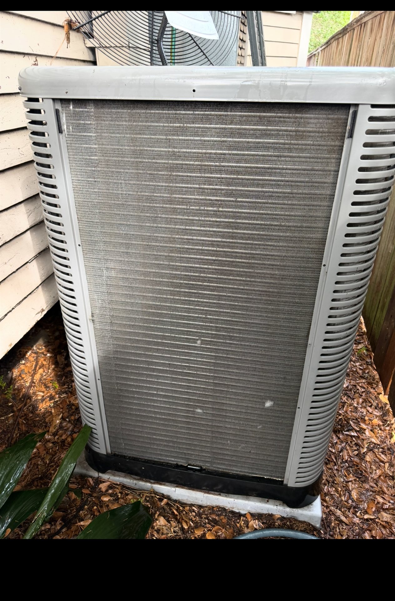 Same A/C condenser coils after professional cleaning - clean and clear
