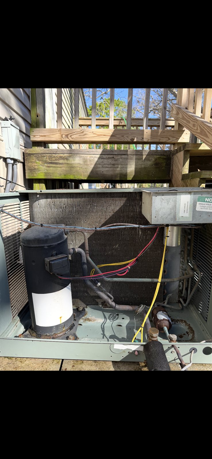 CJ diagnosing and repairing an A/C system